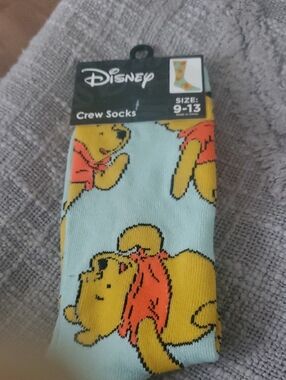 Disney Womens Crew Socks with Yellow Winnie the Pooh on Light Blue